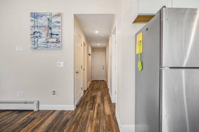 711 Newfield Rd, Shapleigh, ME 04076 - corridor with dark wood-style floors, a baseboard radiator, baseboards, and recessed lighting