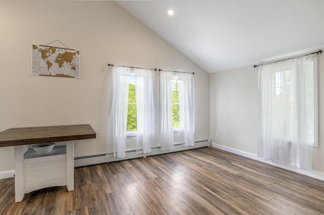 711 Newfield Rd, Shapleigh, ME 04076 - empty room featuring a baseboard radiator, wood finished floors, baseboards, and high vaulted ceiling