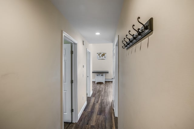 711 Newfield Rd, Shapleigh, ME 04076 - corridor with dark wood finished floors, recessed lighting, and baseboards