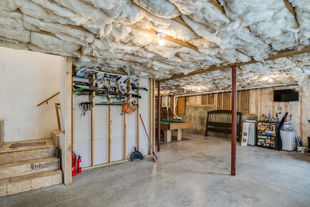 711 Newfield Rd, Shapleigh, ME 04076 - unfinished below grade area featuring pool table and stairway