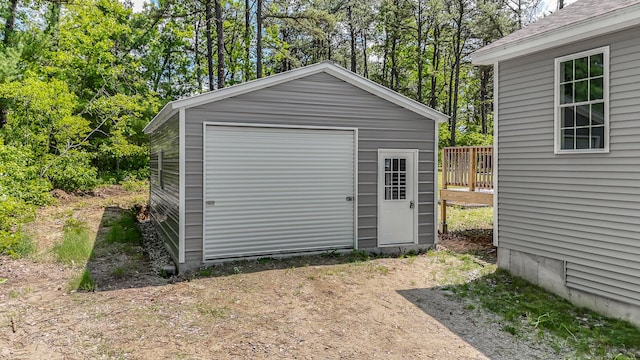 711 Newfield Rd, Shapleigh, ME 04076 - garage with view of wooded area