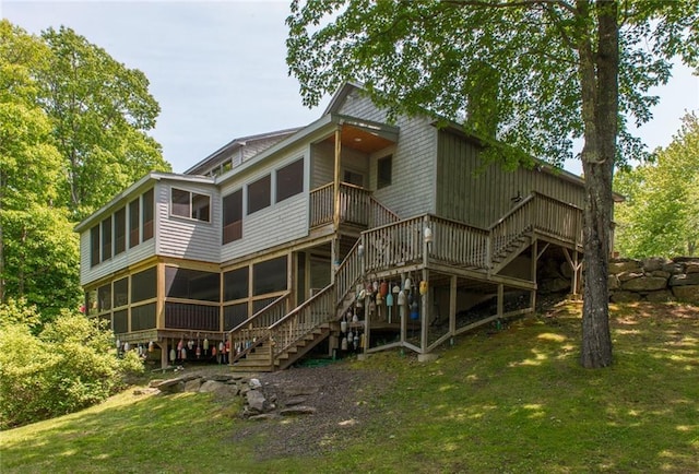 81 Bryers Cir, Boothbay, ME 04537 - back of house with stairs, a sunroom, a deck, and a lawn