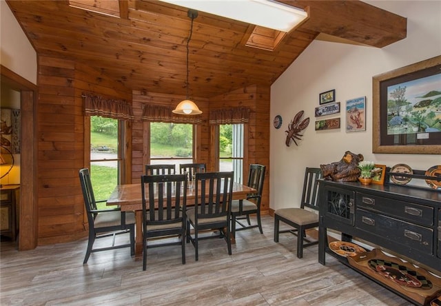 81 Bryers Cir, Boothbay, ME 04537 - dining area featuring vaulted ceiling, light wood-style floors, wood walls, and wooden ceiling