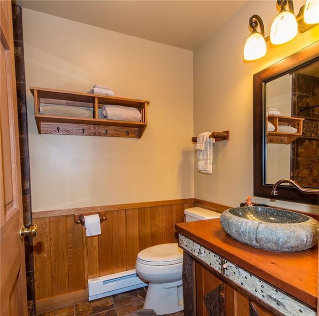 81 Bryers Cir, Boothbay, ME 04537 - bathroom featuring a baseboard radiator, a wainscoted wall, and vanity
