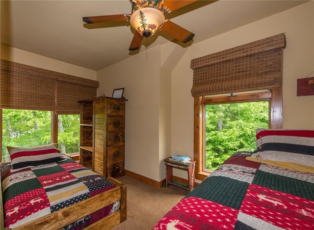 81 Bryers Cir, Boothbay, ME 04537 - carpeted bedroom featuring multiple windows and ceiling fan