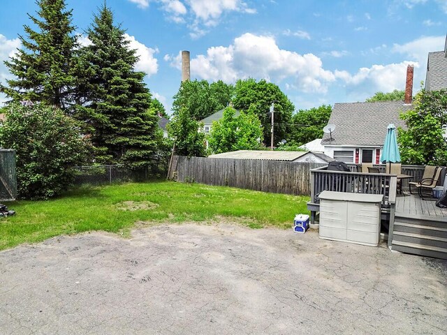 128 Benton Ave, Winslow, ME 04901 - view of yard featuring a deck, a patio area, and outdoor dining space