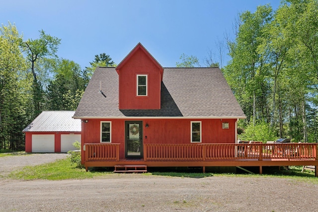 80 Hart St, Newport, ME 04953 - chalet / cabin with roof with shingles, a garage, and a wooden deck