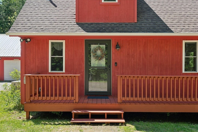 80 Hart St, Newport, ME 04953 - view of exterior entry with roof with shingles and a wooden deck