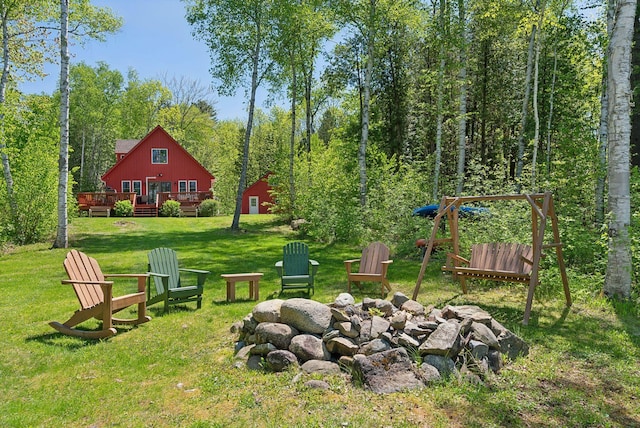 80 Hart St, Newport, ME 04953 - view of grassy yard with a fire pit and a deck