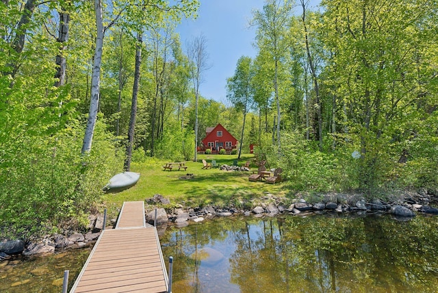 80 Hart St, Newport, ME 04953 - dock area with a lawn