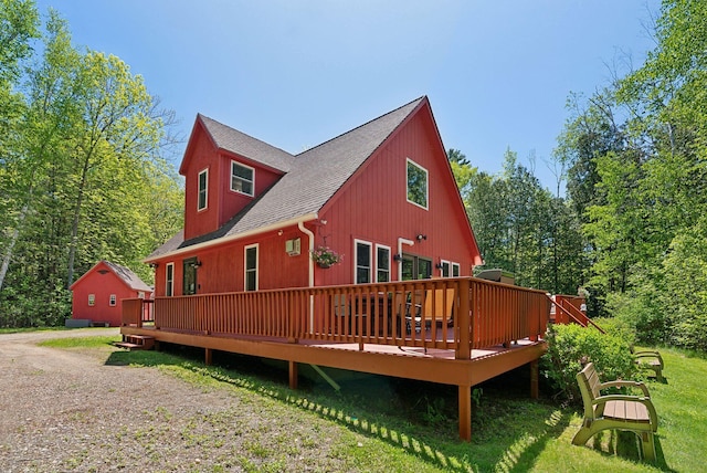 80 Hart St, Newport, ME 04953 - back of property with roof with shingles, a deck, and a lawn