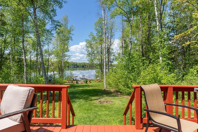 80 Hart St, Newport, ME 04953 - wooden terrace featuring a water view, a lawn, and view of scattered trees