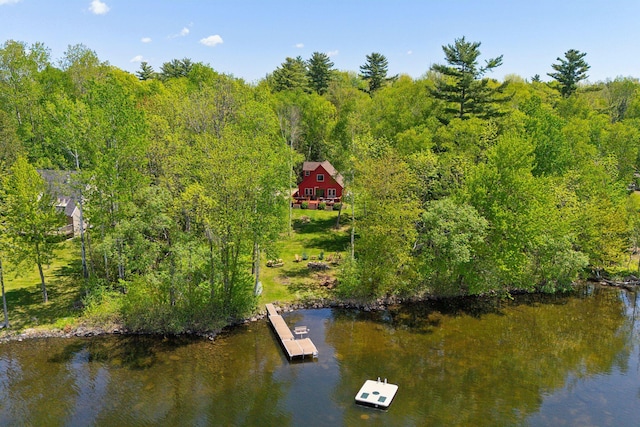 80 Hart St, Newport, ME 04953 - aerial view of property and surrounding area featuring a heavily wooded area and a nearby body of water