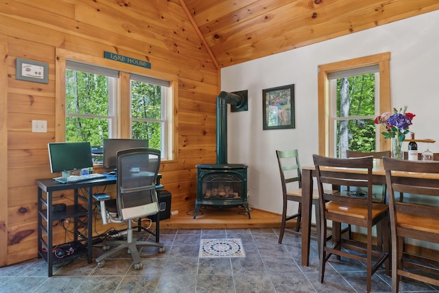 80 Hart St, Newport, ME 04953 - office area with vaulted ceiling, wood walls, a wood stove, stone finish floors, and wooden ceiling
