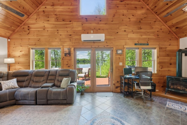 80 Hart St, Newport, ME 04953 - tiled living area with wooden ceiling, a wall unit AC, a wood stove, wooden walls, and high vaulted ceiling