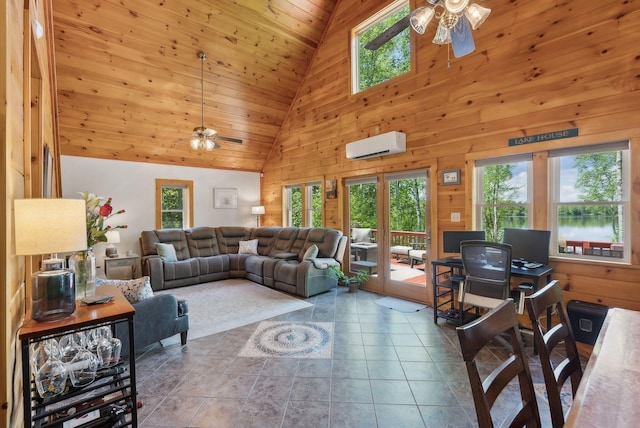 80 Hart St, Newport, ME 04953 - living area with ceiling fan, a wall mounted air conditioner, high vaulted ceiling, wood walls, and wood ceiling
