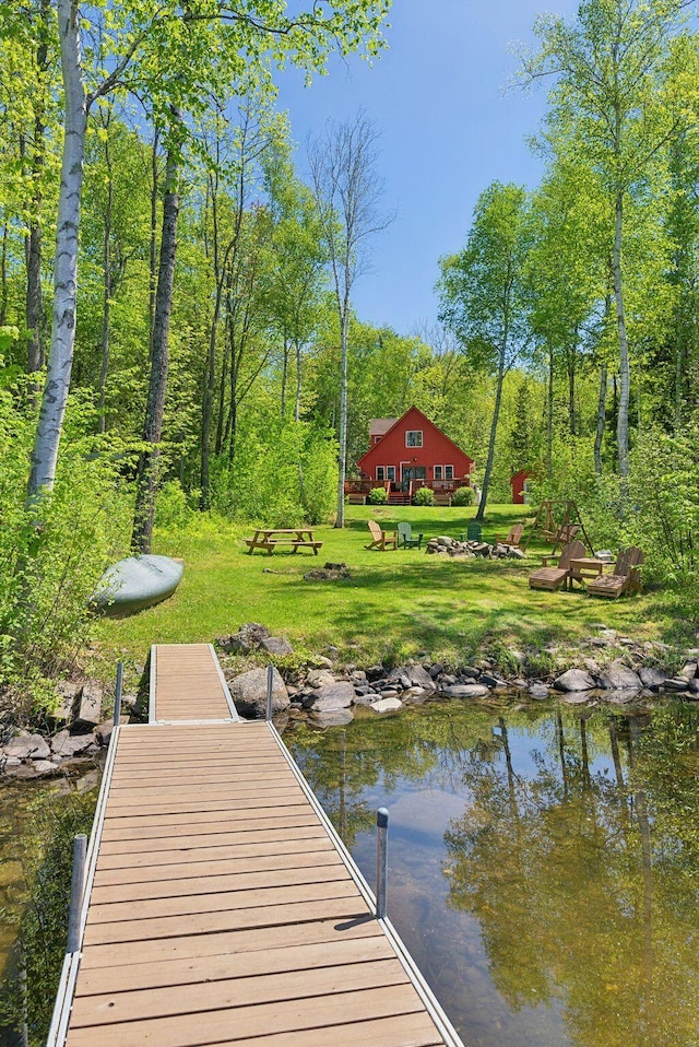 80 Hart St, Newport, ME 04953 - dock featuring a lawn and a water view
