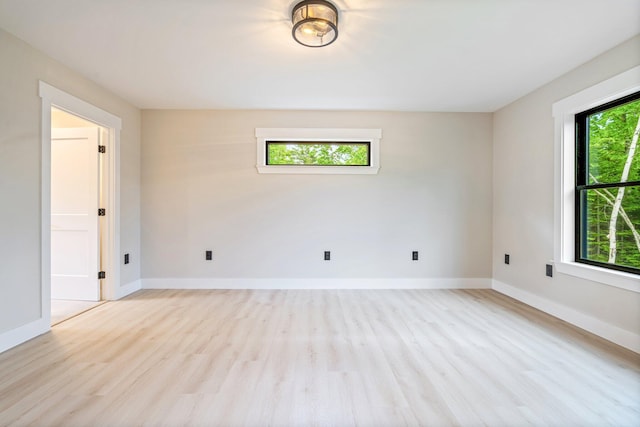 734 Main Rd, Charleston, ME 04422 - empty room featuring light wood-type flooring and baseboards