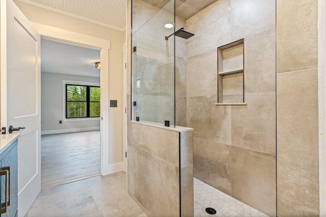 734 Main Rd, Charleston, ME 04422 - bathroom featuring a walk in shower, vanity, and crown molding