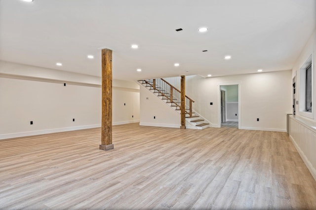 734 Main Rd, Charleston, ME 04422 - basement featuring stairway, light wood-style flooring, and recessed lighting