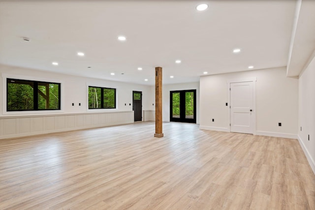 734 Main Rd, Charleston, ME 04422 - unfurnished living room with plenty of natural light, light wood-type flooring, and recessed lighting