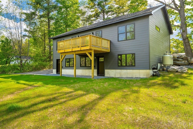 734 Main Rd, Charleston, ME 04422 - back of house with a yard and a wooden deck