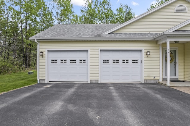 8 Macintosh Ln, Lewiston, ME 04240 - garage with asphalt driveway