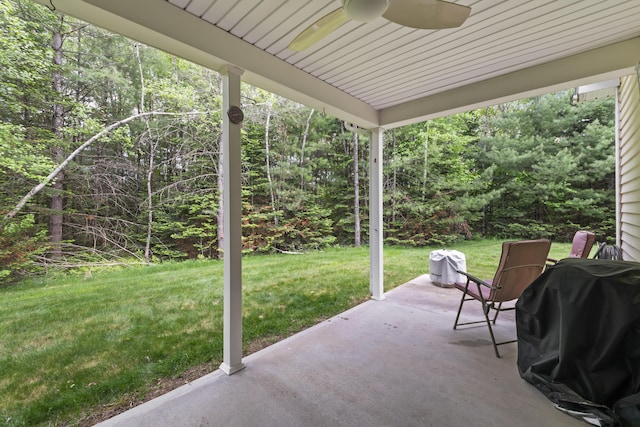 8 Macintosh Ln, Lewiston, ME 04240 - view of patio with a ceiling fan and a wooded view