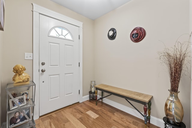 8 Macintosh Ln, Lewiston, ME 04240 - foyer with light wood finished floors and baseboards