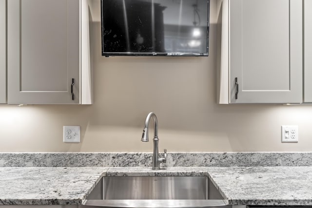 8 Macintosh Ln, Lewiston, ME 04240 - detailed view of a sink and light stone countertops