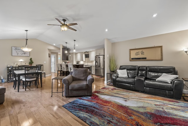 8 Macintosh Ln, Lewiston, ME 04240 - living room featuring vaulted ceiling, a ceiling fan, light wood-type flooring, baseboards, and recessed lighting