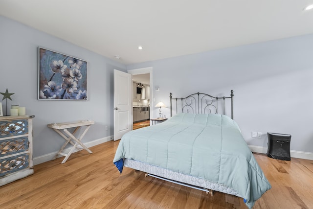 8 Macintosh Ln, Lewiston, ME 04240 - bedroom with light wood-style floors, baseboards, and recessed lighting
