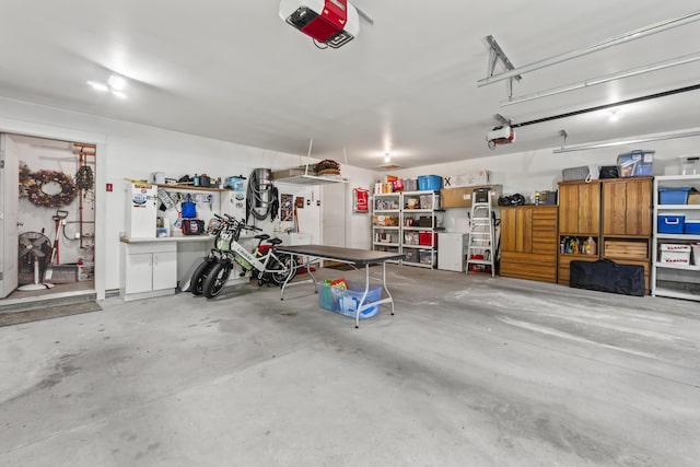 8 Macintosh Ln, Lewiston, ME 04240 - garage featuring a garage door opener