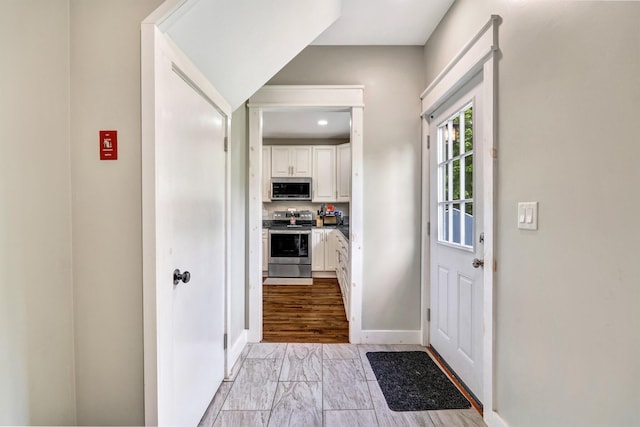 727 Hammond St, Bangor, ME 04401 - foyer featuring baseboards