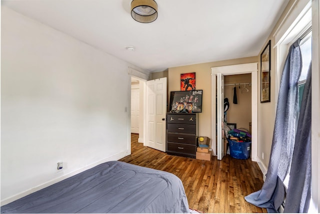 727 Hammond St, Bangor, ME 04401 - bedroom featuring wood finished floors, baseboards, and a closet