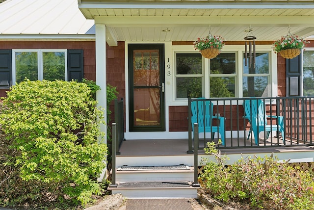 193 Park Ln, Windsor, ME 04363 - property entrance featuring a porch and a standing seam roof