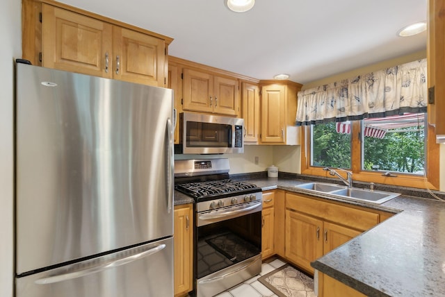 193 Park Ln, Windsor, ME 04363 - kitchen featuring appliances with stainless steel finishes, a sink, dark countertops, and recessed lighting