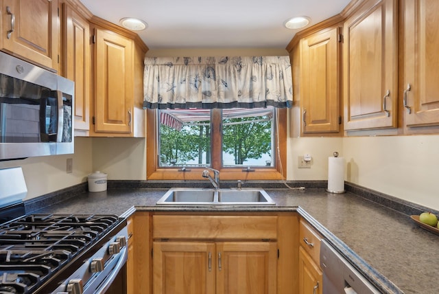 193 Park Ln, Windsor, ME 04363 - kitchen featuring stainless steel appliances, a sink, and dark countertops
