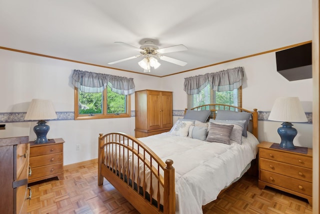 193 Park Ln, Windsor, ME 04363 - bedroom with multiple windows, ornamental molding, ceiling fan, and baseboards