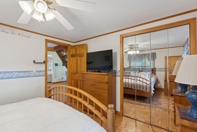 193 Park Ln, Windsor, ME 04363 - bedroom with ornamental molding, a ceiling fan, and multiple windows