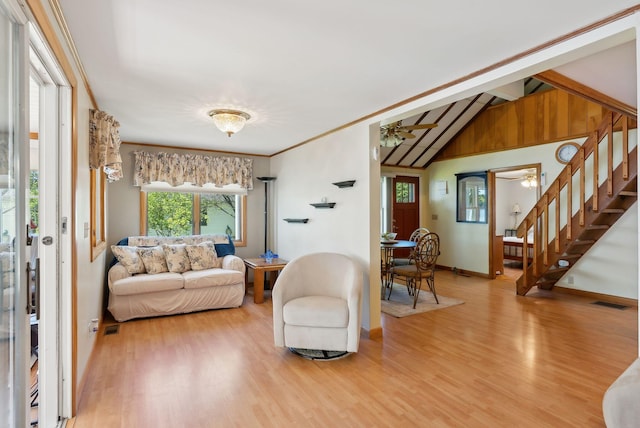 193 Park Ln, Windsor, ME 04363 - living area with stairway, wood finished floors, ceiling fan, lofted ceiling, and baseboards