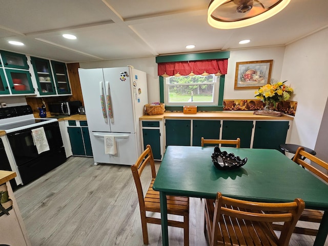 856 Weeks Mills Rd, New Sharon, ME 04955 - kitchen with freestanding refrigerator, electric range oven, green cabinetry, light wood-style floors, and recessed lighting