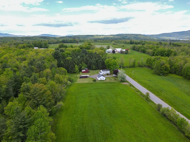 856 Weeks Mills Rd, New Sharon, ME 04955 - overview of rural landscape with a mountain backdrop and a forest