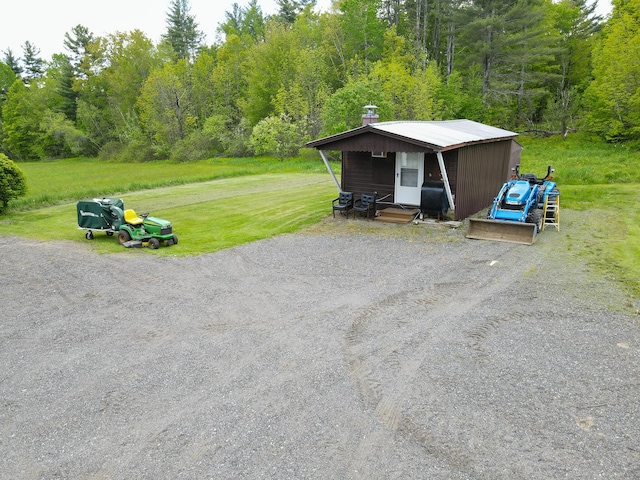 856 Weeks Mills Rd, New Sharon, ME 04955 - view of patio / terrace featuring a view of trees and grilling area