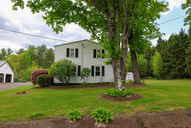 856 Weeks Mills Rd, New Sharon, ME 04955 - view of side of property featuring a lawn