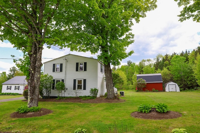 856 Weeks Mills Rd, New Sharon, ME 04955 - view of side of home with a yard
