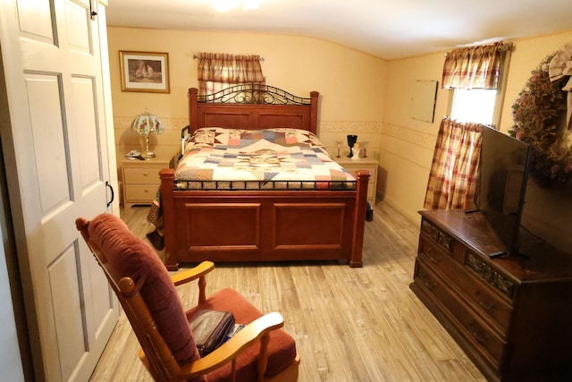 856 Weeks Mills Rd, New Sharon, ME 04955 - bedroom featuring light wood-style floors and wainscoting
