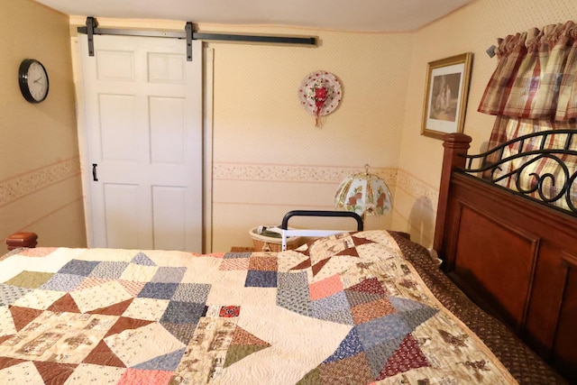 856 Weeks Mills Rd, New Sharon, ME 04955 - dining area featuring a barn door and a wainscoted wall