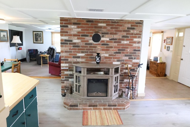 856 Weeks Mills Rd, New Sharon, ME 04955 - dining space with a wood stove and baseboards