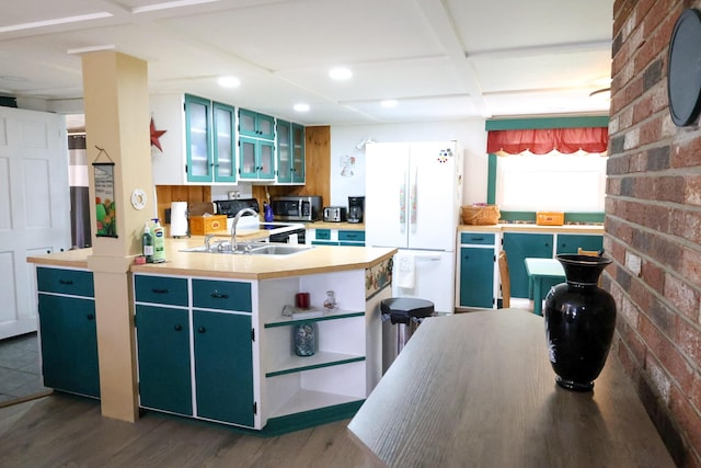 856 Weeks Mills Rd, New Sharon, ME 04955 - kitchen with freestanding refrigerator, a sink, stainless steel microwave, dark wood-type flooring, and recessed lighting